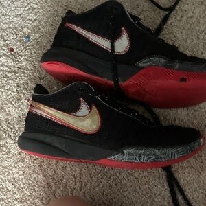 Nike Black and Gold Athletic Shoes